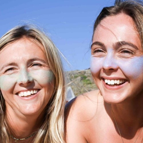 Suntribe Zinc Sticks SPF 50 - Women on the beach - Reef safe sunscreen (Landscape)-2-min